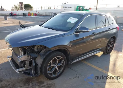 2018 BMW X1 xDrive28I z USA, uszkodzony, nr VIN WBXHT3C33J5F89654